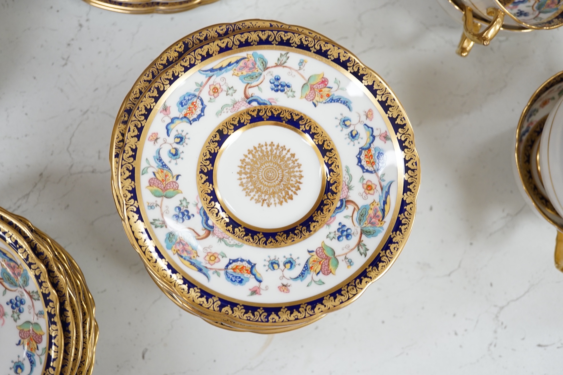 An extensive Paragon bone china dinner service to include tureens, plates and sauce boats. Condition - fair to good